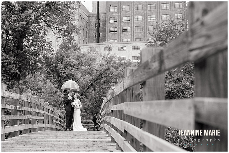 Minneapolis Event Center, umbrella, rainy day, Minnesota wedding, Minneapolis wedding, bride, groom, bridge, wedding dress