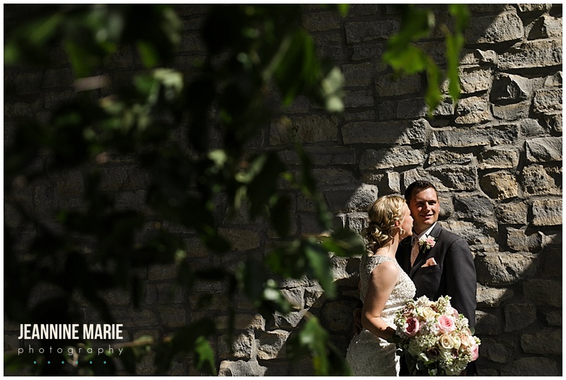 shadows, garden, stone wall, bride, groom, kiss on cheek, Minnesota Landscape Arboretum, Hazeltine National Golf Course, Petit Four FIlms, KMB Floral, The Thirsty Whale Bakery, Illuminations by Lori Cole, Instant Request DJ, SM Hair and Makeup, The Wedding Shoppe, Men's Wearhouse, outdoor wedding, garden wedding, blush wedding, Minnesota wedding venues, Twin Cities wedding venues, Minnesota wedding photographer, Saint Paul wedding photographer, Jeannine Marie Photography